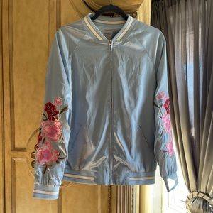 Blue jacket with embroidered roses